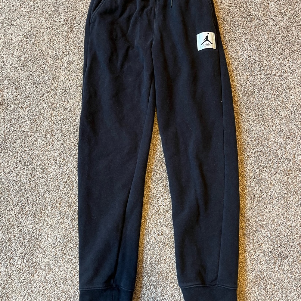 Jordan Black Sweatpants with Tapered Leg and Elastic Cuffs